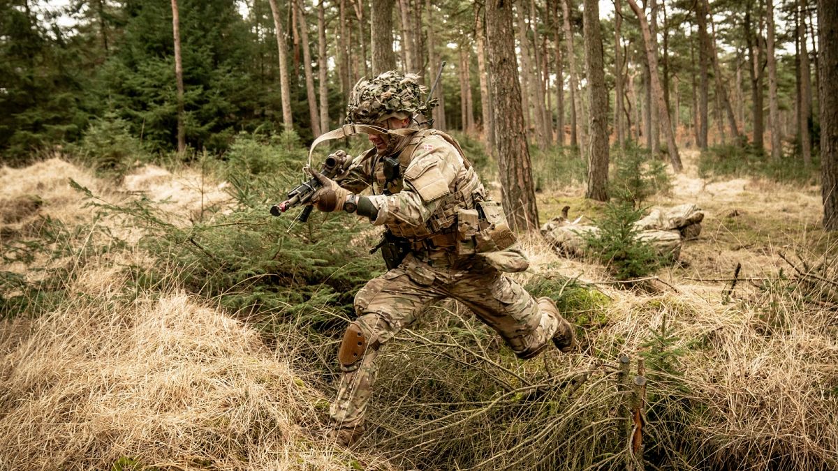 Soldiers from the Schleswig Infantry Regiment train at the Oksboel Shooting and Training Ground, Jutland, Denmark, Thursday March 16, 2023.