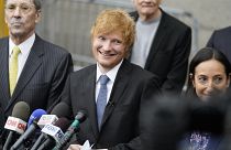 Ed Sheeran departs after speaking to the media outside New York Federal Court after wining his copyright infringement trial