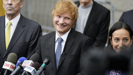 Ed Sheeran departs after speaking to the media outside New York Federal Court after wining his copyright infringement trial