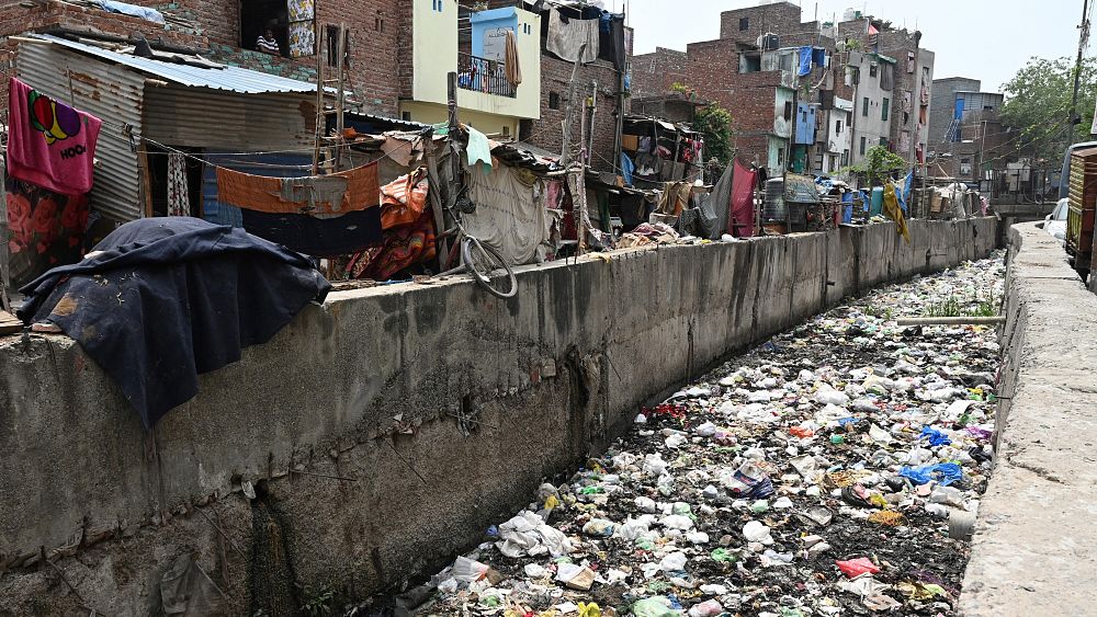 India's cities struggle with sewage and waste as population grows