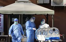 Mitarbeiter eines Pekinger Krankenhauses