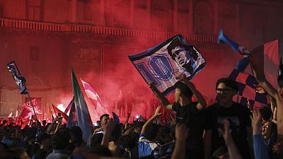 Napoli fans celebrate Thursday, May 4, 2023, in Naples, Italy, after their soccer team won the Serie A soccer title.