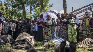 Families mourn the victims of the devastating floods in the Democractic Republic of Congo's South Kivu region