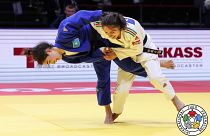 Sabina Giliazova of Russia and Blandine Pont of France, bottom, in action during the women's -48 category at the World Judo Championships in Doha, Qatar, Sunday, April 5, 2023