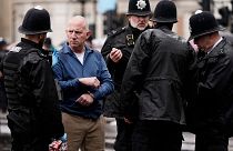 Police arrest an anti-monarchy demonstrators ahead of the procession of Britain's King Charles III to Westminster Abbey for his coronation in London Saturday, May 6, 2023. 