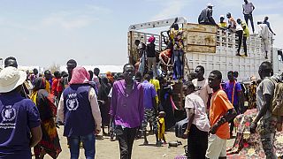 People fleeing their homes in Sudan.