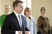 National Coalition Party leader Petteri Orpo (front) and (L-R) Riikka Purra (Finns Party), Anna-Maja Henriksson (SFP/RKP), Sari Essayah (Christian Democrats)