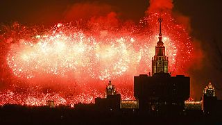 Fireworks explodes over the historic building of the Moscow State University in Russia, Tuesday, May 9, 2023 during Victory Day.