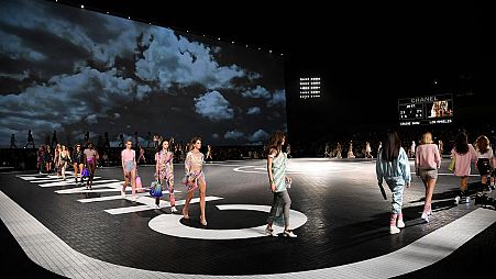 Models on the catwalk at Chanel's 2023/4 Cruise show in Los Angeles