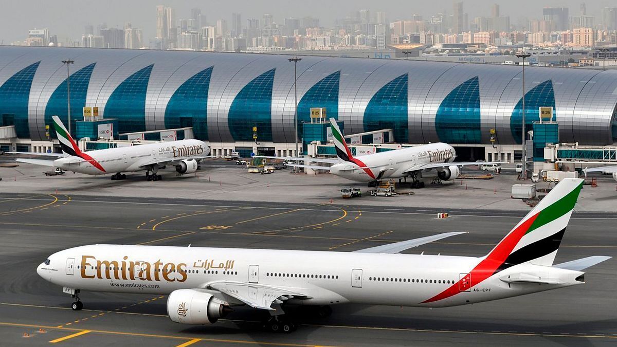 An Emirates plane taxis to a gate at Dubai International Airport at Dubai International Airport in Dubai.