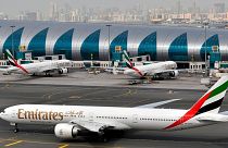 An Emirates plane taxis to a gate at Dubai International Airport at Dubai International Airport in Dubai.