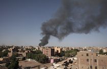 FILE - Smoke is seen in Khartoum, Sudan, Wednesday, April 19, 2023.
