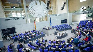 Lawmakers attend a meeting of the German federal parliament, Bundestag, in the Reichstag building in Berlin, 10 May 2023.