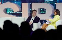Twitter CEO Elon Musk speaks with Linda Yaccarino, chairman of global advertising and partnerships for NBC, at the POSSIBLE conference, April 18, 2023, in Miami , Fla., USA.