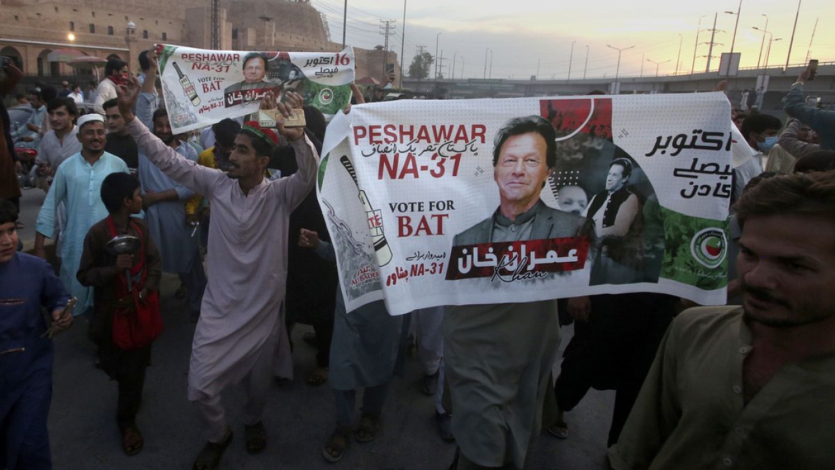 Supporters of Pakistan's former Prime Minister Imran Khan celebrate after Supreme Court decision, in Peshawar, Pakistan, Thursday, May 11, 2023.