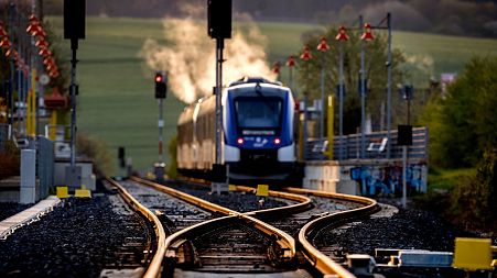 A train leaves the station in Wehrheim near Frankfurt, Germany, Thursday, 27 April 2023.