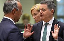 Eurogroup President Paschal Donohoe, right, speaks with Greece's Finance Minister Christos Staikouras during a meeting of eurozone finance ministers at the European Council.