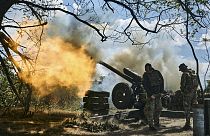 Ukrainian soldiers fire a cannon near Bakhmut, an eastern city where fierce battles against Russian forces have been taking place, in the Donetsk region, Ukraine. 