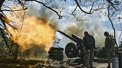 Ukrainian soldiers fire a cannon near Bakhmut, an eastern city in the Donetsk region, Ukraine, Friday, May 12, 2023 