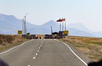 A checkpoint manned by Russian peacekeepers on a road leading toward Nagorno-Karabakh