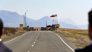 A checkpoint manned by Russian peacekeepers on a road leading toward Nagorno-Karabakh