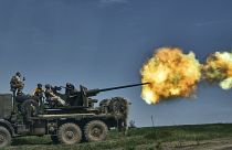 Ukrainian soldiers fire a cannon near Bakhmut, an eastern city where fierce battles against Russian forces have been taking place, in the Donetsk region, Ukraine, Monday, May 
