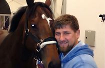 Ramzan Kadyrov with his horse Zazu. 