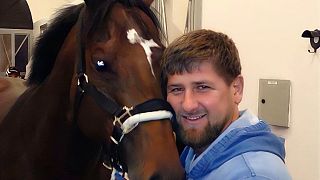 Ramzan Kadyrov with his horse Zazu. 