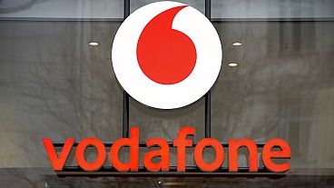 The logo for the Vodafone brand on one of its retail stores in Berlin, Germany. Tuesday, Feb. 1, 2022. 