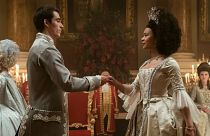 Corey Mylchreest as young King George and India Ria Amarteifio as young Queen Charlotte.