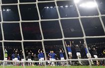 Team Inter Milan celebrate after the Champions League semifinal first leg soccer match between AC Milan and Inter Milan at the San Siro stadium in Milan.
