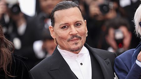 Johnny Depp poses for photographers upon arrival at the opening ceremony and the premiere of the film 'Jeanne du Barry' at the 76th international film festival in Cannes.