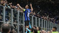 Lautaro Martinez celebrates with Inter Milan fans after scoring in the 74th minute