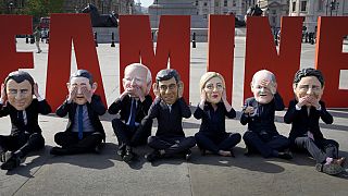 Oxfam's satirical 'big heads' of the G7 leaders pose ahead of the start of the G7 summit in Japan, in Trafalgar Square, London, Wednesday, May 17, 2023.