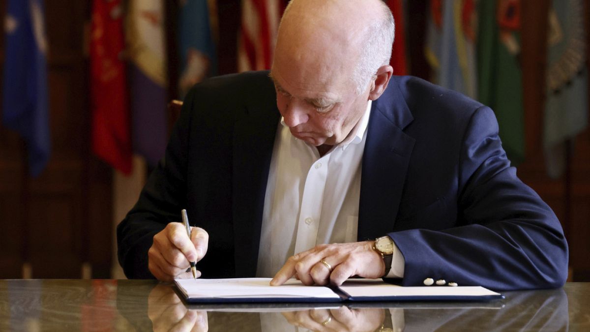 Republican Gov. Greg Gianforte signs a law banning TikTok in the state, May 17, 2023