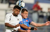 Fiji's Thomas Dunn, left, and Slovakia's Mate Szolgai, go for a header during a FIFA U-20 World Cup in San Juan, Argentina, May 20, 2023