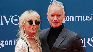 British musician and songwriter Sting and his wife Trudie Styler arrive for the annual Ivor Novello Awards at Grosvenor House in London
