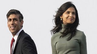 ritain's Prime Minister Rishi Sunak and his wife Akshata Murty board a plane in Tokyo, May 18, 2023