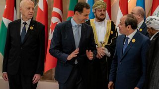Syria's Assad attends first Arab league summit in 12 years, meets with African leaders