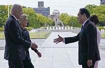 US President Joe Biden and first lady Jill Biden are welcomed by Japan's Prime Minister Fumio Kishida and his wife Yuko Kishida at the Hiroshima Peace Memorial                