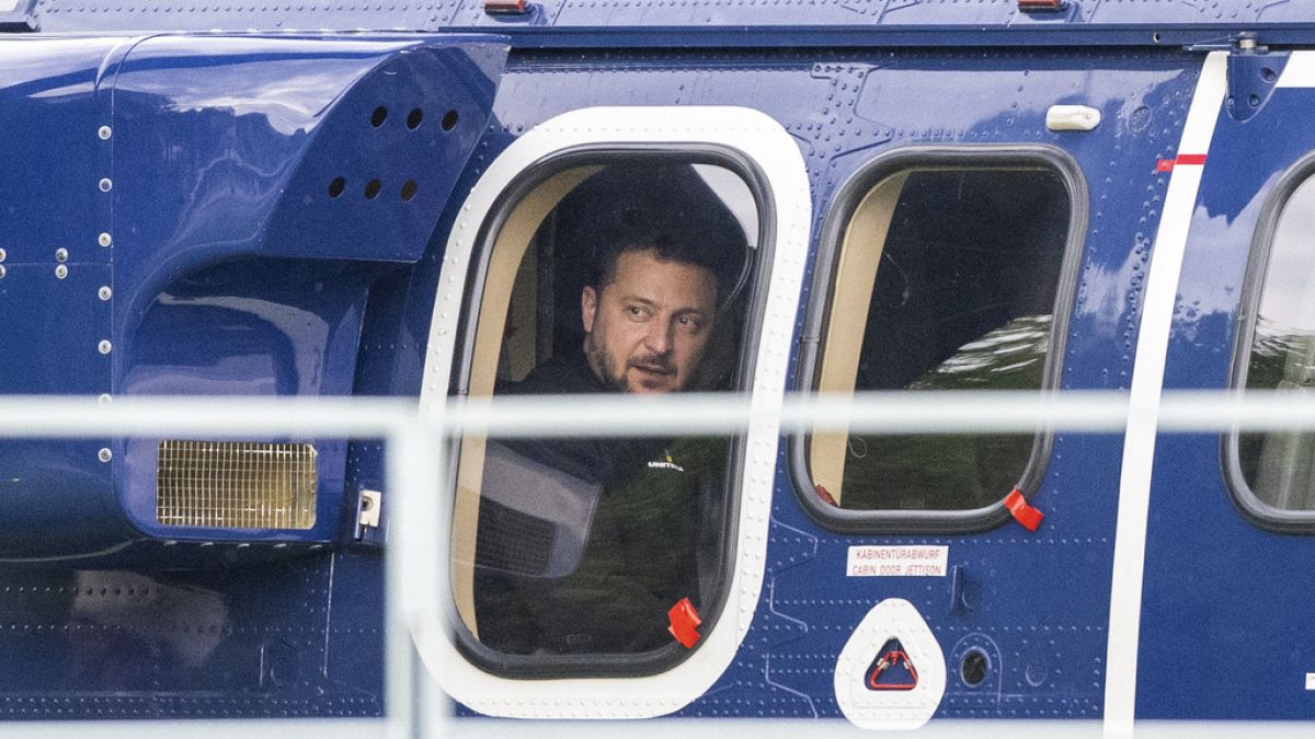 FILE - Ukrainian President Volodymyr Zelenskyy, sits in a Federal Police helicopter after talks with Chancellor Olaf Scholz in Berlin, Germany, Sunday, May 14, 2023. 