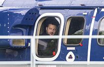 FILE - Ukrainian President Volodymyr Zelenskyy, sits in a Federal Police helicopter after talks with Chancellor Olaf Scholz in Berlin, Germany, Sunday, May 14, 2023.