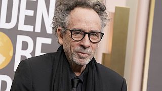 FILE: Tim Burton arrives at the 80th annual Golden Globe Awards at the Beverly Hilton Hotel, Jan. 10, 2023, in Beverly Hills,