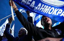 Supporters of Greece's Prime Minister and leader of New Democracy Kyriakos Mitsotakis shout slogans outside the headquarters of his party in Athens, Greece, 21 May 2023