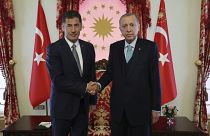 الرئيس التركي رجب طيب إردوغان والمرشح الرئاسي سنان أوغان