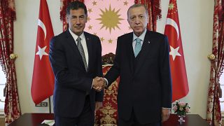 الرئيس التركي رجب طيب إردوغان والمرشح الرئاسي سنان أوغان