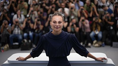 Alicia Vikander poses for photographers at the photo call for the film 'Firebrand' at the 76th international film festival, Cannes, southern France, Monday, May 22, 2023. 
