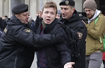 Belarus police arrest journalist Raman Pratasevich, center, in Minsk, Belarus.
