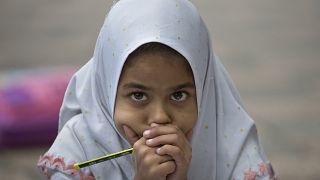 فتاة في مدرسة في إسلام أباد، باكستان, 2018.