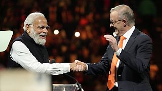 Indian Prime Minister Narendra Modi shakes hands with his Australian counterpart Anthony Albanese as at Qudos Bank Arena in Sydney, Australia, Tuesday, May 23, 2023
